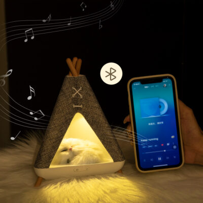 Vibrant tent night light and speaker combo, offering dynamic lighting and clear sound for a fun and interactive atmosphere.