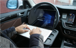 Compact and sturdy car steering wheel desk, ideal for working, eating, or using your laptop while on the move.