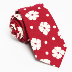 Red flower necktie with a white floral pattern in cotton fabric, offering a fresh, elegant look with a touch of sophistication.